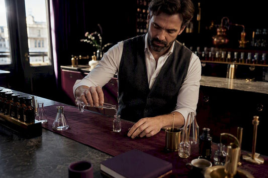 Perfumer measuring aromatic fragrance layers