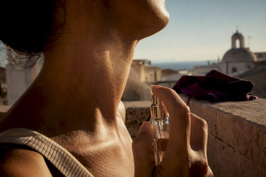 Applying fragrance on a warm summer day