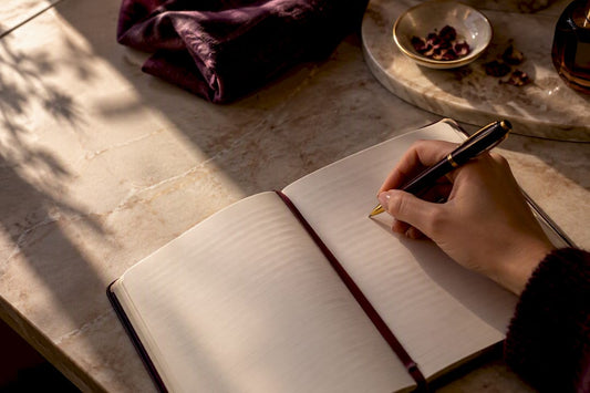 Hand recording a personal scent diary