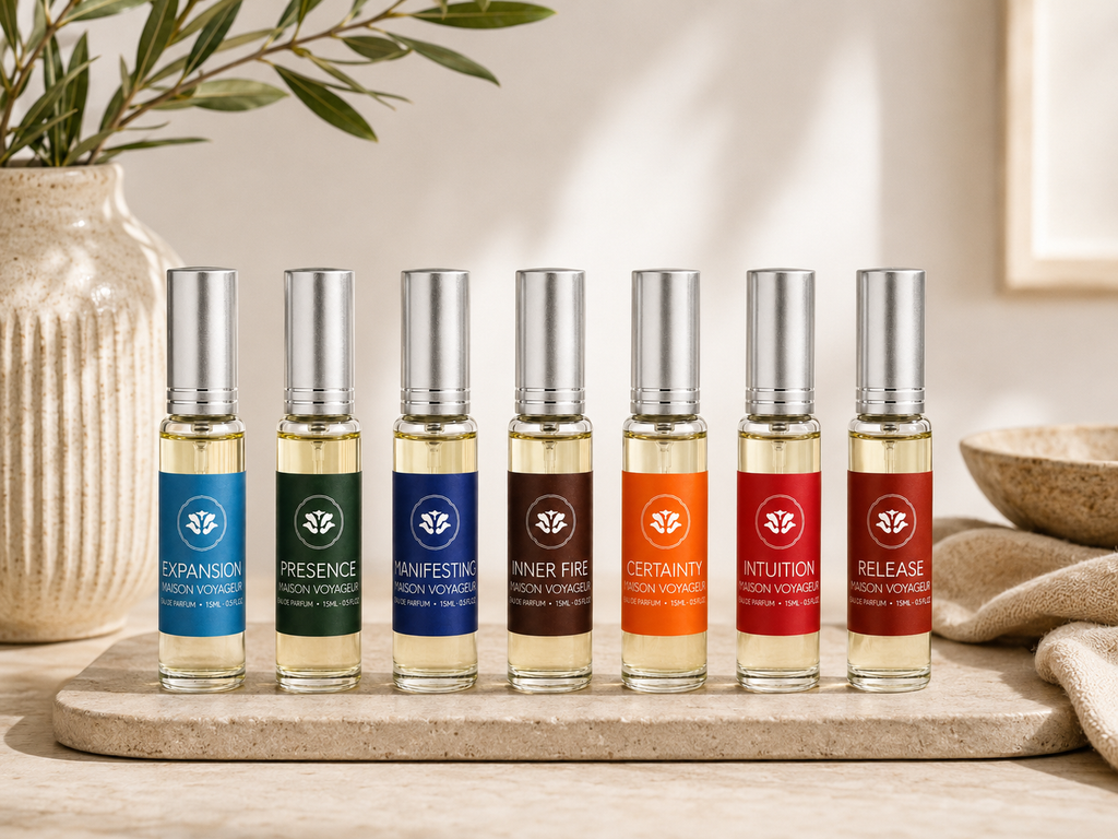 Voyage 7 archetypes lifestyle composition · Maison Voyageur seven eau de parfum 15ml travel bottles Manifesting Expansion Intuition Inner Fire Certainty Presence Release · artisanal Madrid